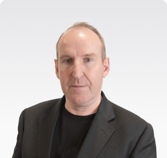 Headshot of Neil McDonald, Chief Executive Officer (CEO) of trading app moomoo.